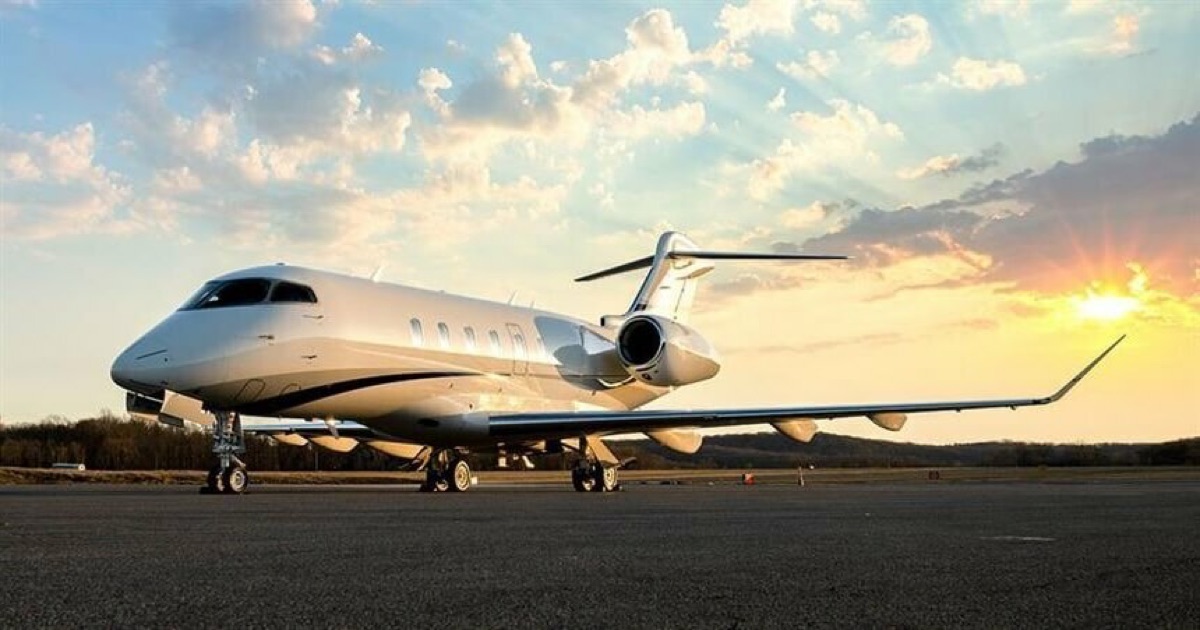 Bombardier Challenger jet on the apron at sunset, an aircraft type used for medium-range medical transfers